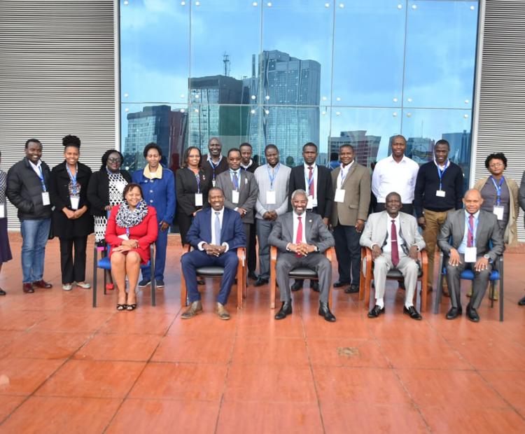 Dr. Kamau Gachigi (Seated 2nd Left), Chief Guest and Founding Executive Director, Gearbox Pan African Networks, pose for a group photo with presenters and participants after opening the Seminar. Also, in the photo is Prof Stephen Kiama (Seated Centre), UoN Vice-Chancellor, John Onyango (Seated 2nd Right), Institute's Acting Managing Director, Said Ramadhan (Right) of ARIPO and Prof. Mary Kinoti (Seated Left), Director, UoN's Intellectual Management Office of Research Innovation and Enterprise